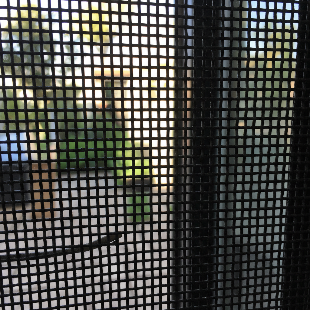 Close-up of 16-gauge cold-rolled steel material with matte black powder coating finish