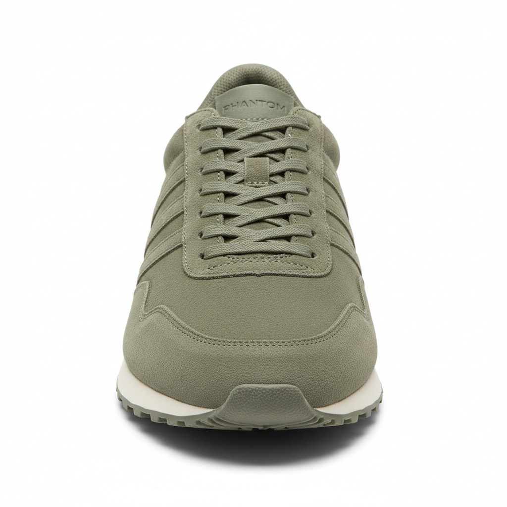 Black and green running sneaker angled view, athletic studio photography