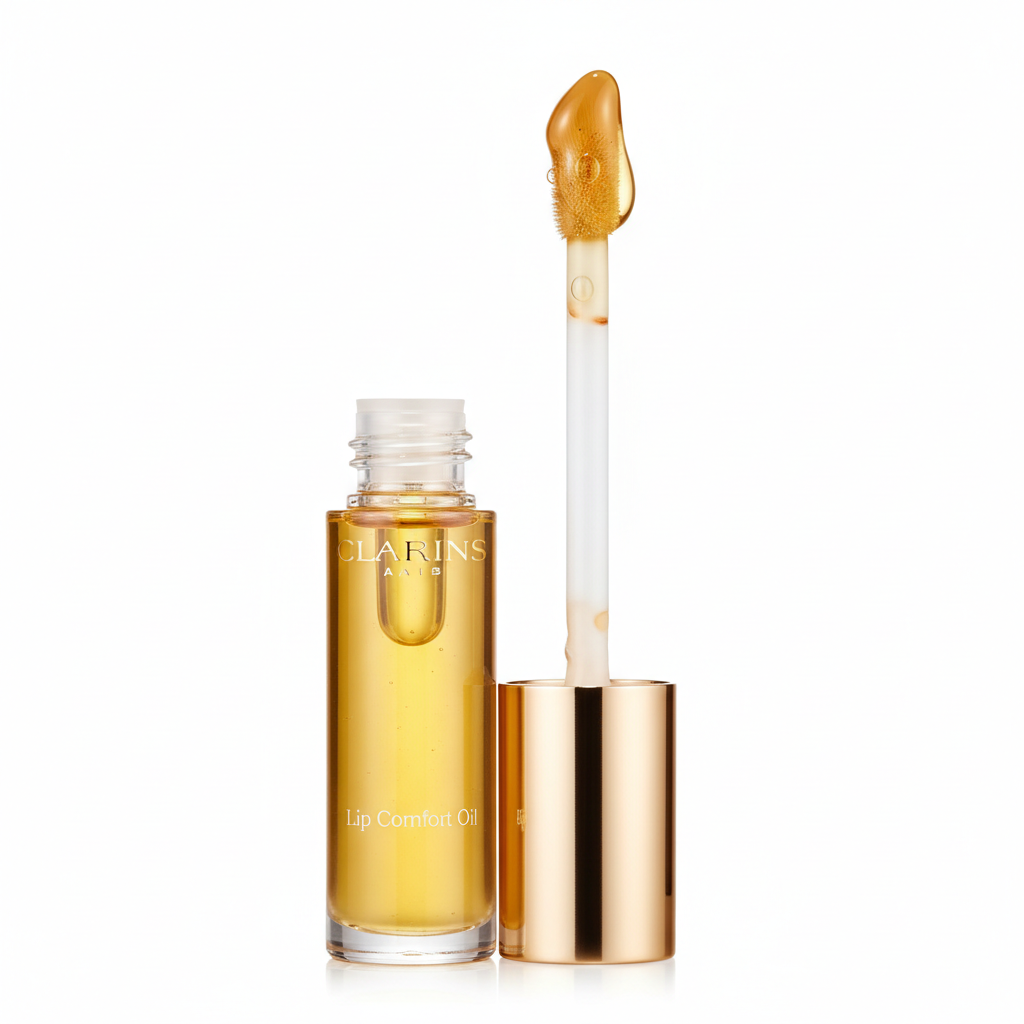 Clarins Lip Comfort Oil in honey shade, barely used with original applicator