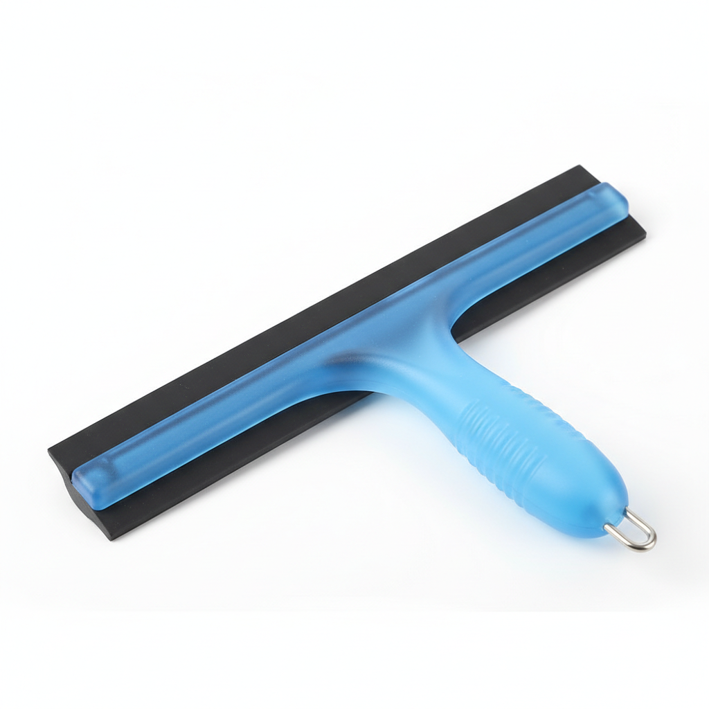 Small handheld squeegee tool for bathroom mirror cleaning, close up