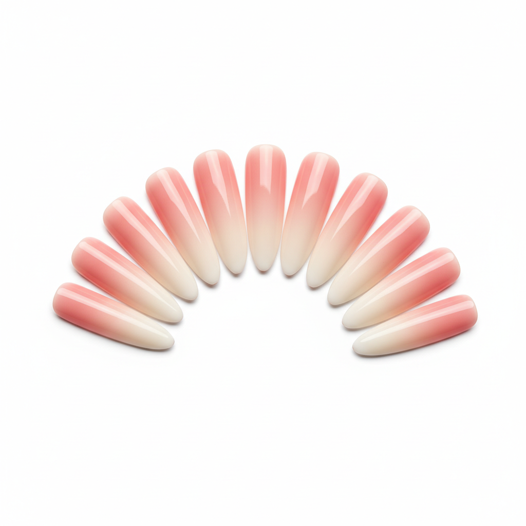 Soft ombre gradient nails blending blush pink to ivory, natural window light, airy pastel studio