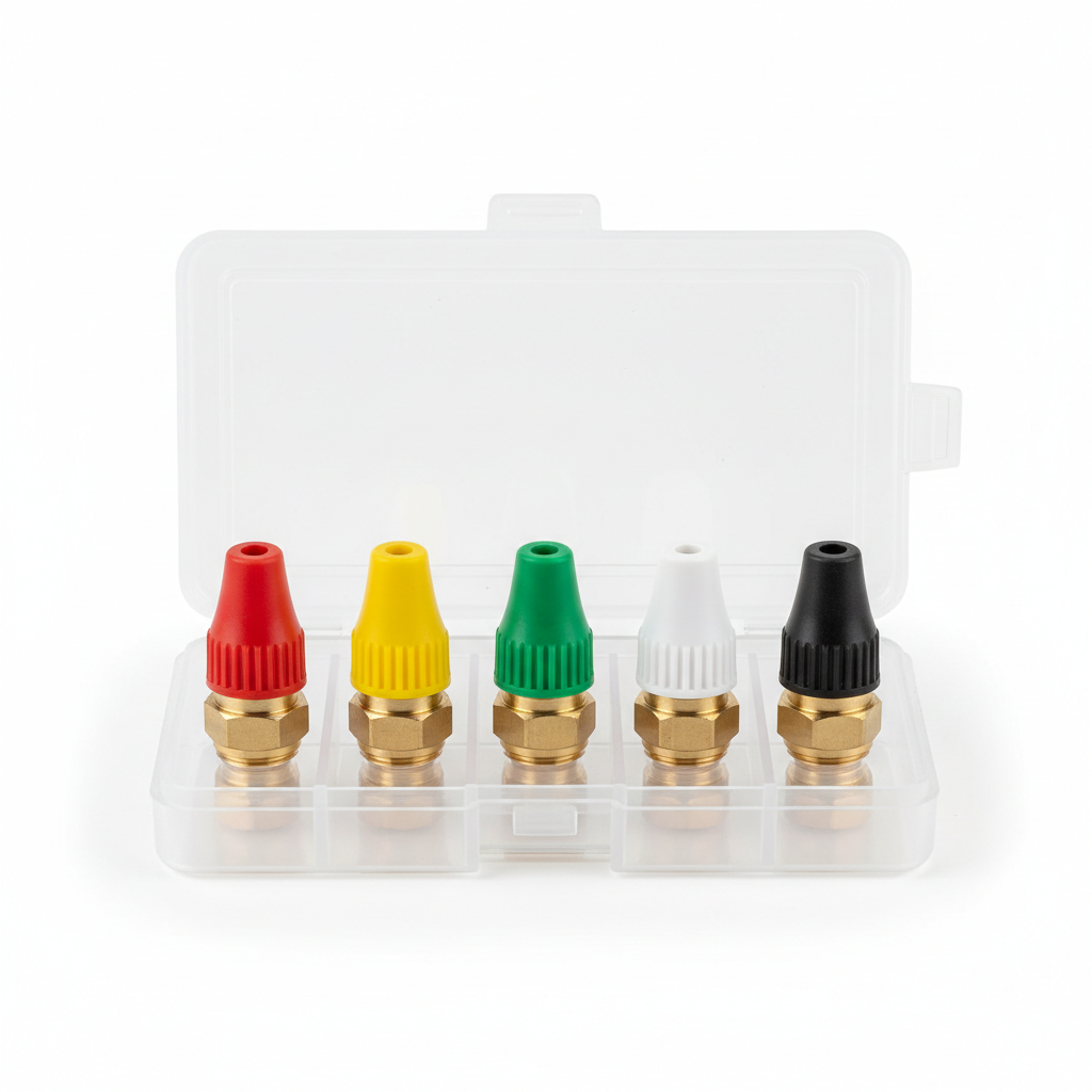 Five color-coded pressure washing nozzle tips arranged on white surface, professional accessories, clean display