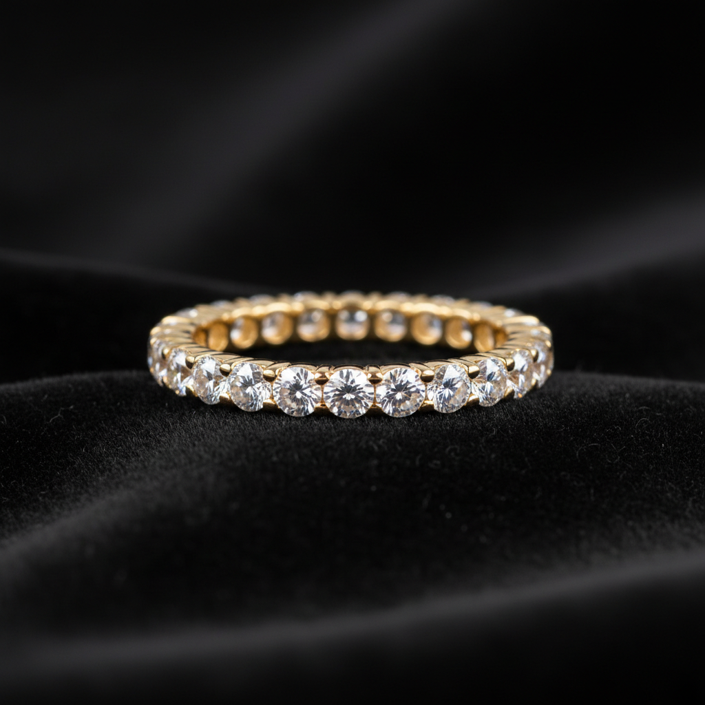 Elegant 24K gold diamond ring with brilliant cut center stone on white velvet display