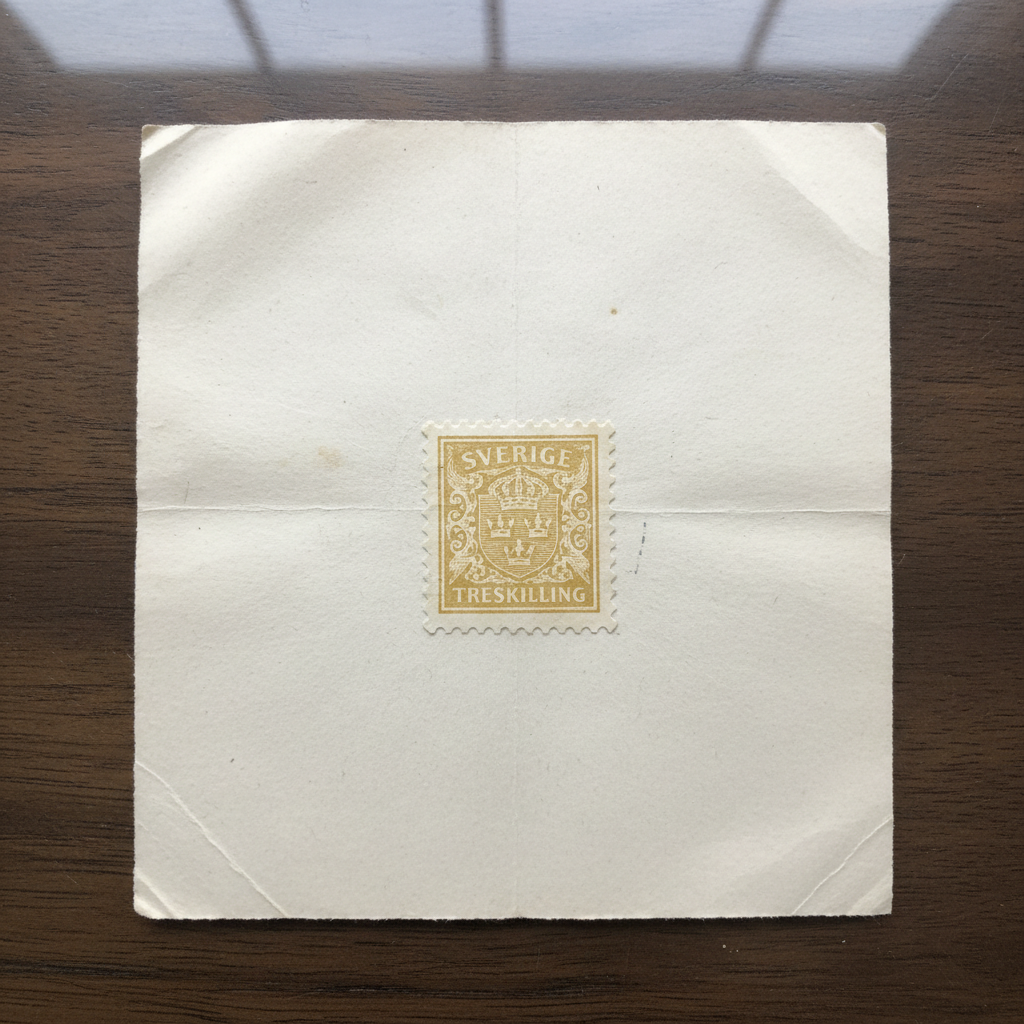 Rare yellow Swedish error stamp on thick cream paper with large margins