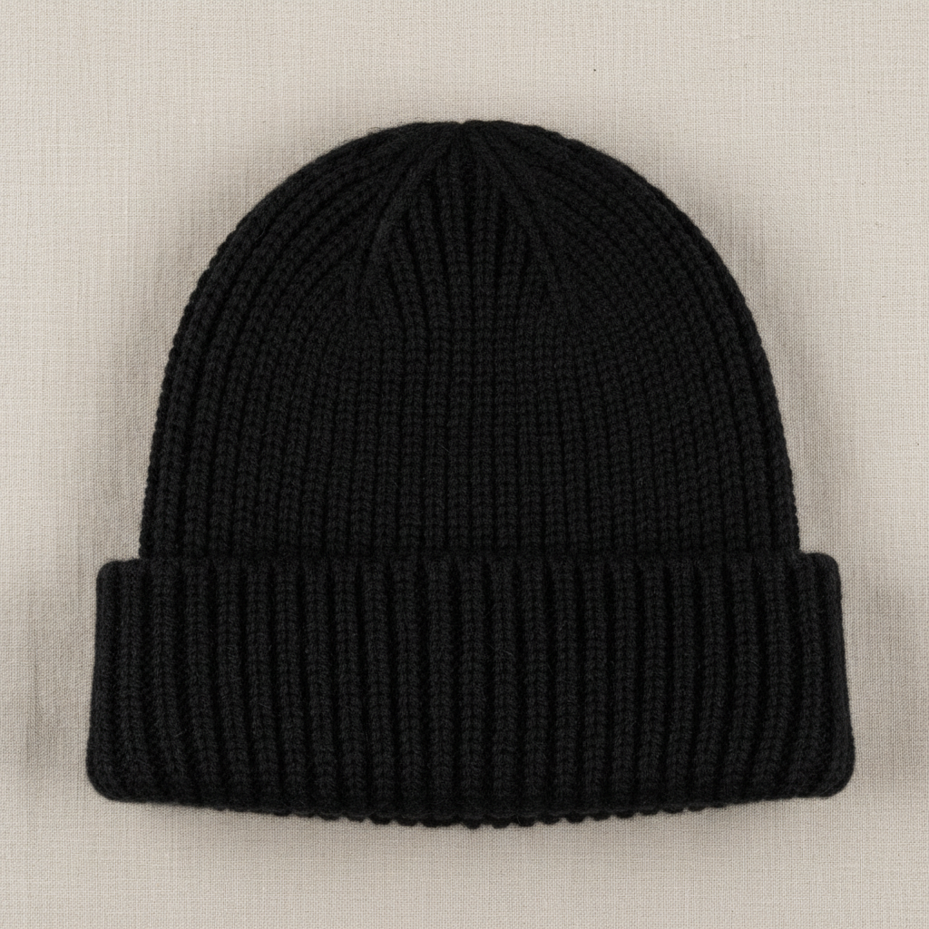 Navy wool beanie hat on clean white background